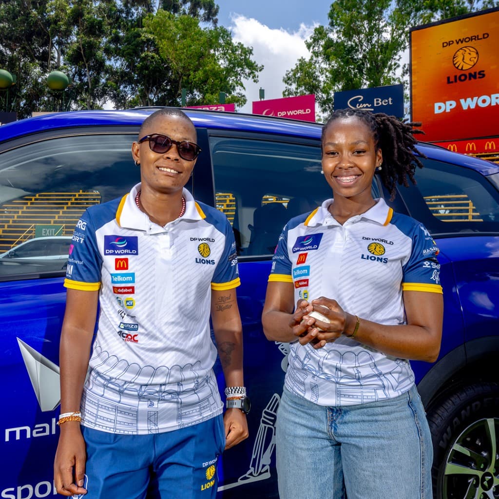 DP World Lions players with a Mahindra vehicle at Wanderers Stadium